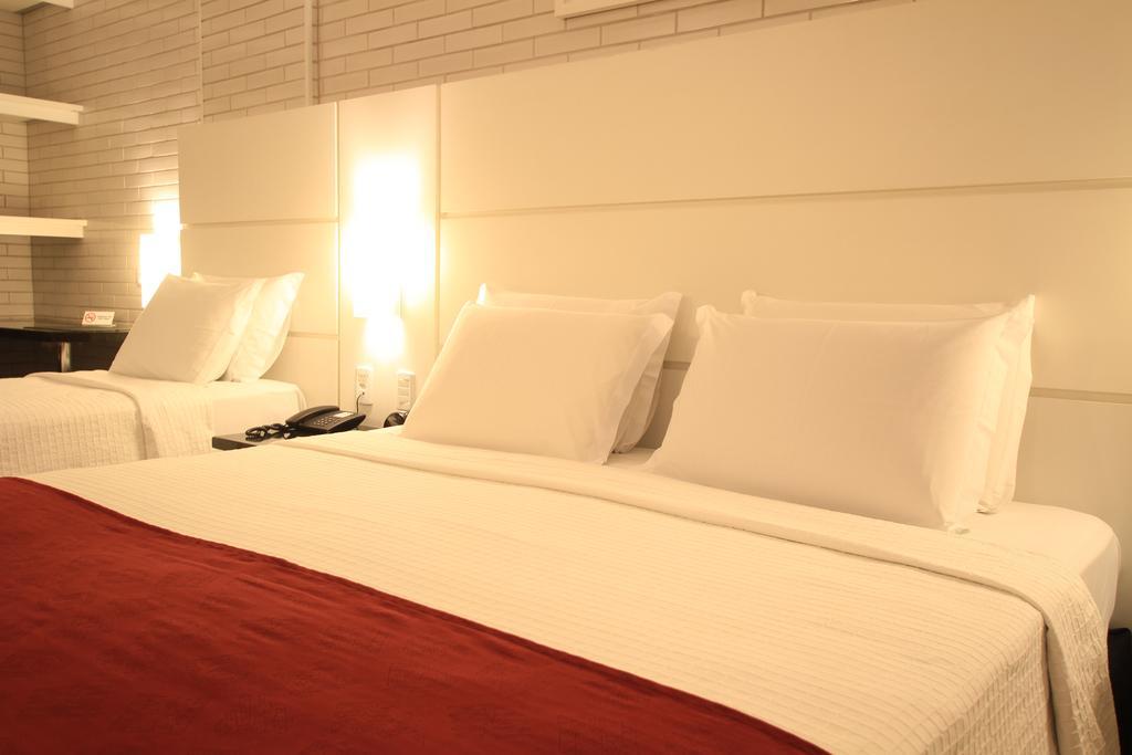 Hotel Confiance Prime Batel Curitiba Zimmer foto
